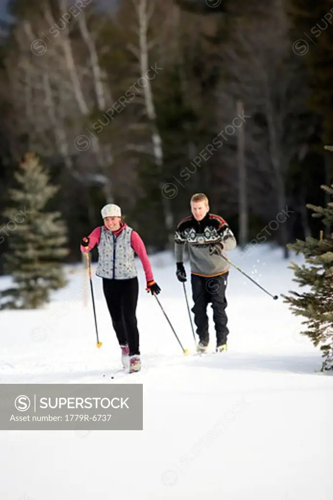Couple cross country skiing