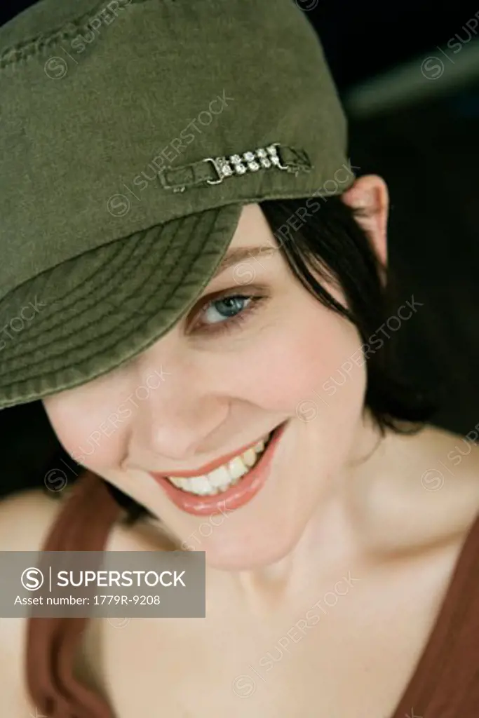Close up of woman smiling with hat