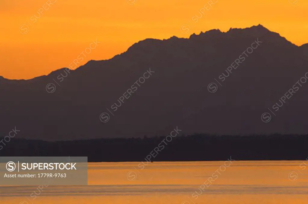 Dusk over mountains and lake, Puget Sound and Olympic Mountains, Washington, United States