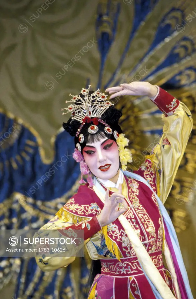 A performer in dance pose, Beijing Opera, Beijing, China.