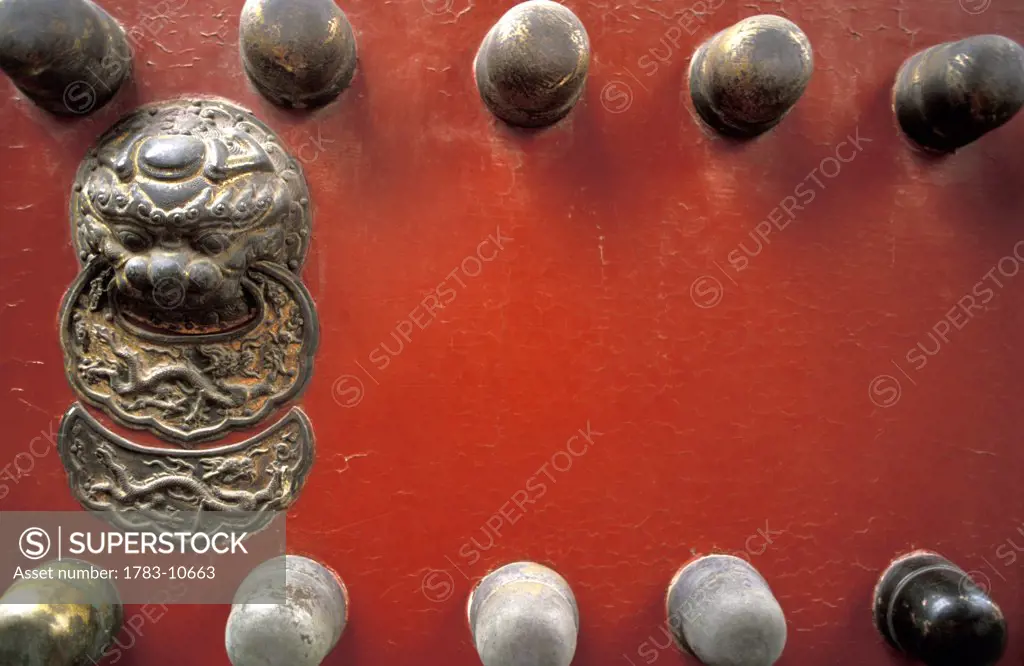 Details of a red door at  Forbidden City, Beijing, China 