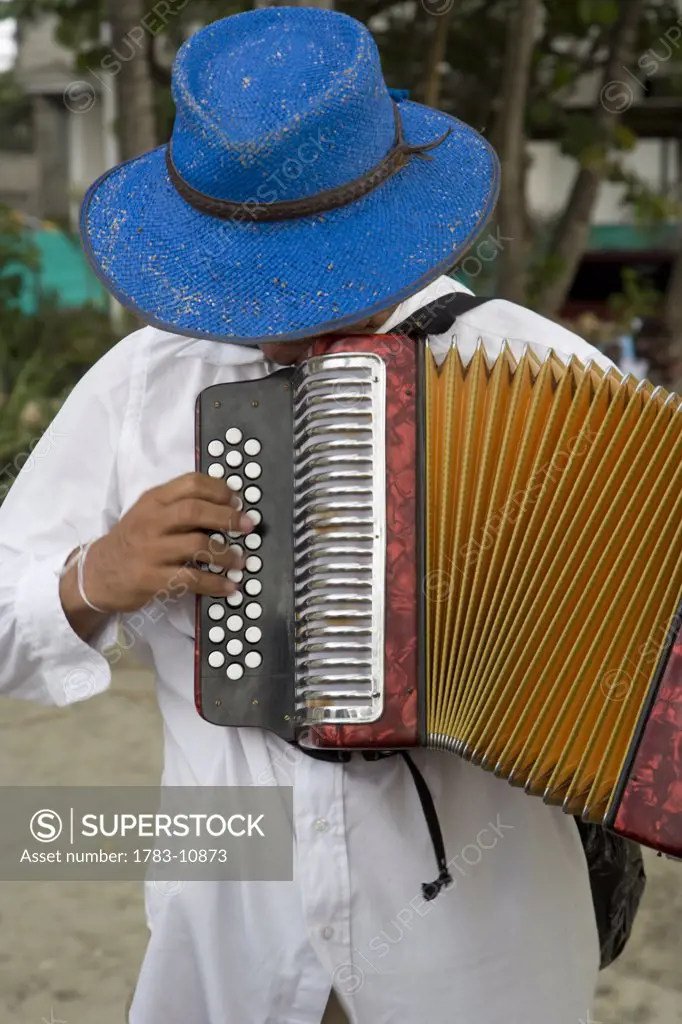 Man playing accordion, Bocagrande, Cartagena, Colombia.