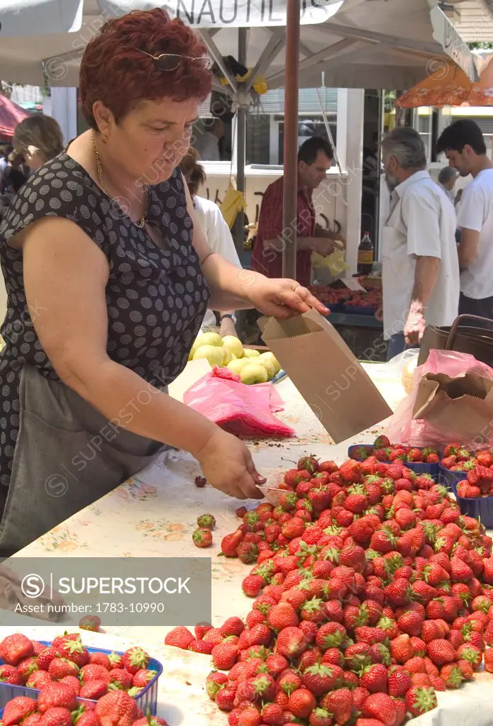 Strawberry seller in market, Split, Split-Dalmatia County, Croatia.