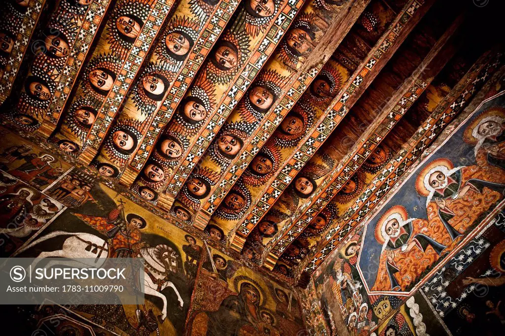 Details of the painted ceiling and walls in Debre Berhan Selassie church; Gondar, Amhara region, Ethiopia