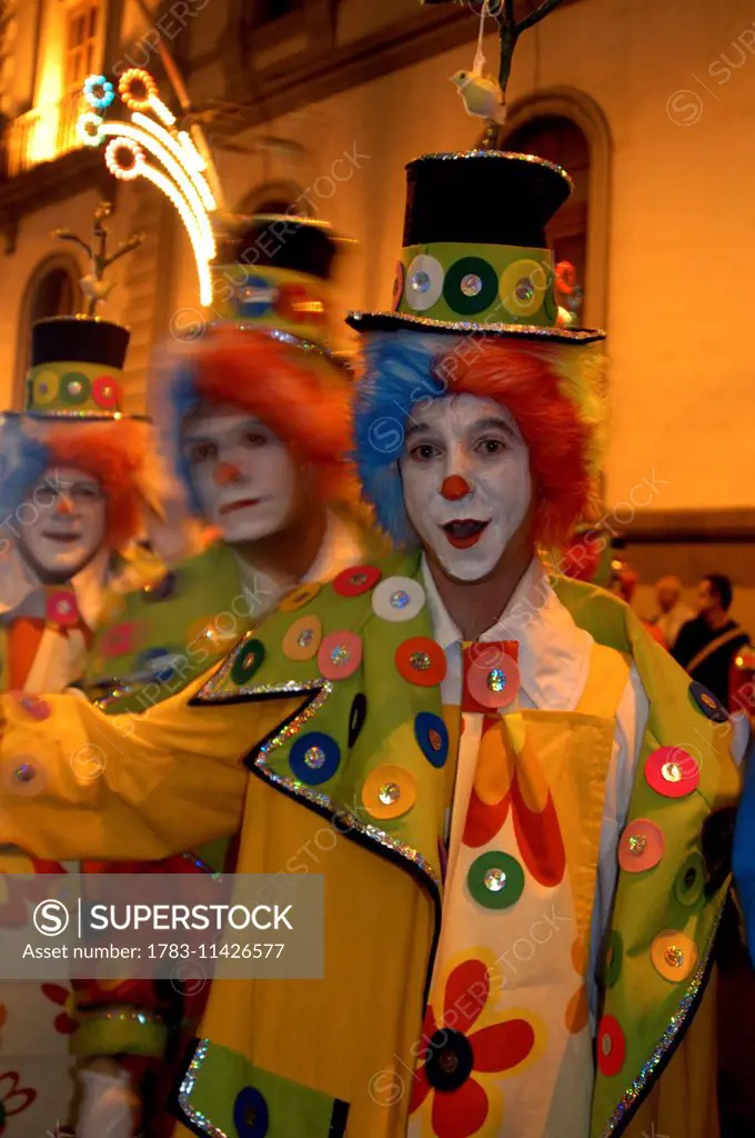 Canary Islands, Santa Cruz De Tenerife: Clowns Processing Through The Streets At The City's Annual Carnival. Copyright Anna Watson/Axiom.