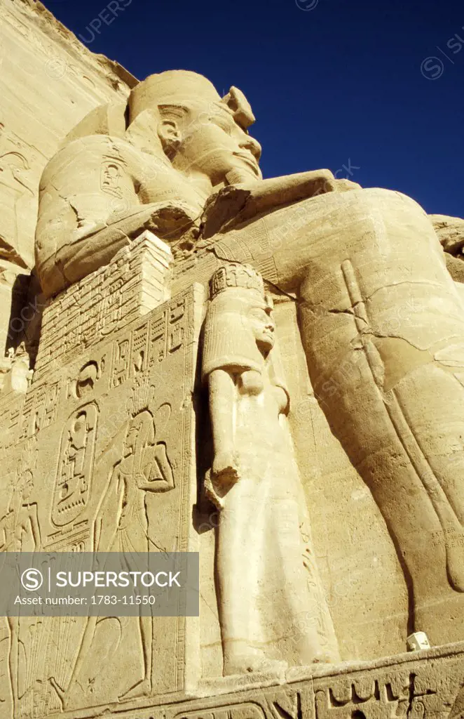 Statue of Ramses II and wife at Great Temple of Ramses II, Abu Simbel , Egypt