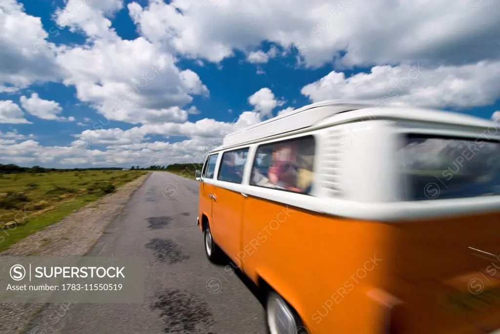 Old Campervan Driving Through Heathland, Blurred Motion