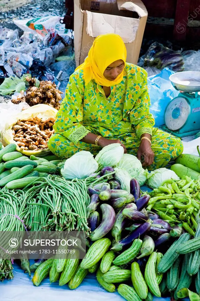 Muslim Woman Selling Vegetables