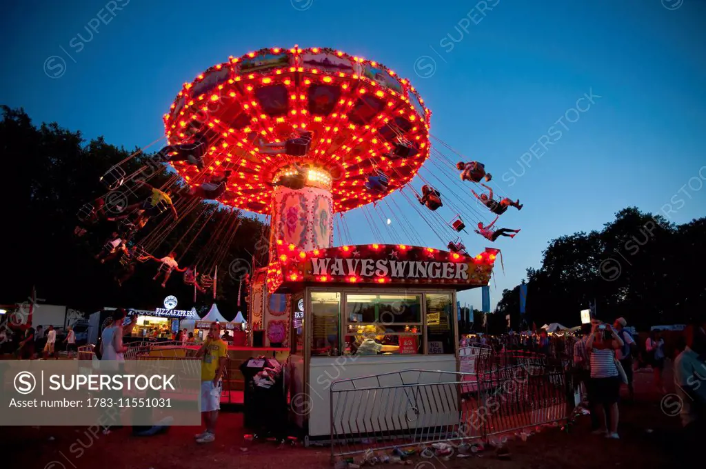Festival Goers Having A Night Ride On A Waveswinger At Lovebox Festival In Victoria Park, London, Uk
