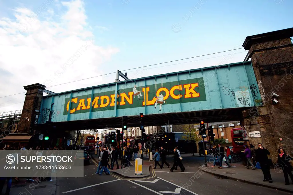 View Of Tourists Under The Bridge In Camden Town, North London, Lonoon, Uk
