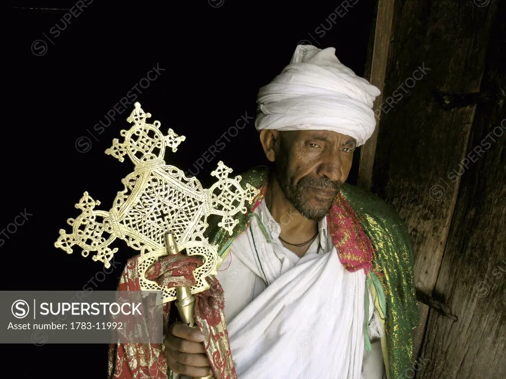 Priest displaying the cross, Lalibela, Ethiopia, .
