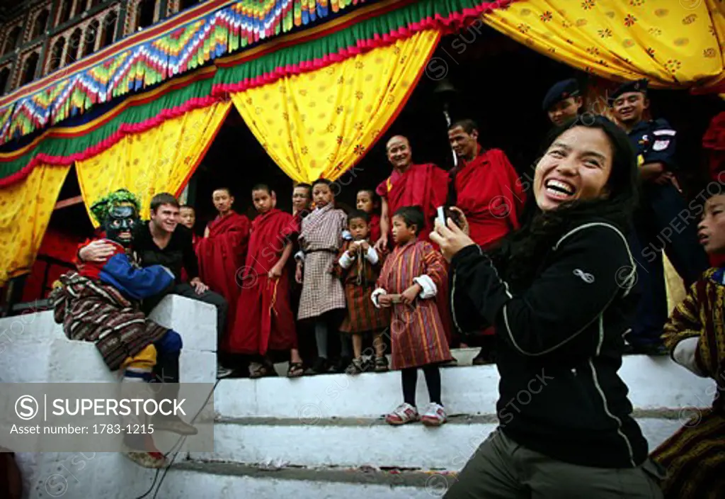 A tourist takes photo at Tashi Chhodzong, Thimpu , Bhutan