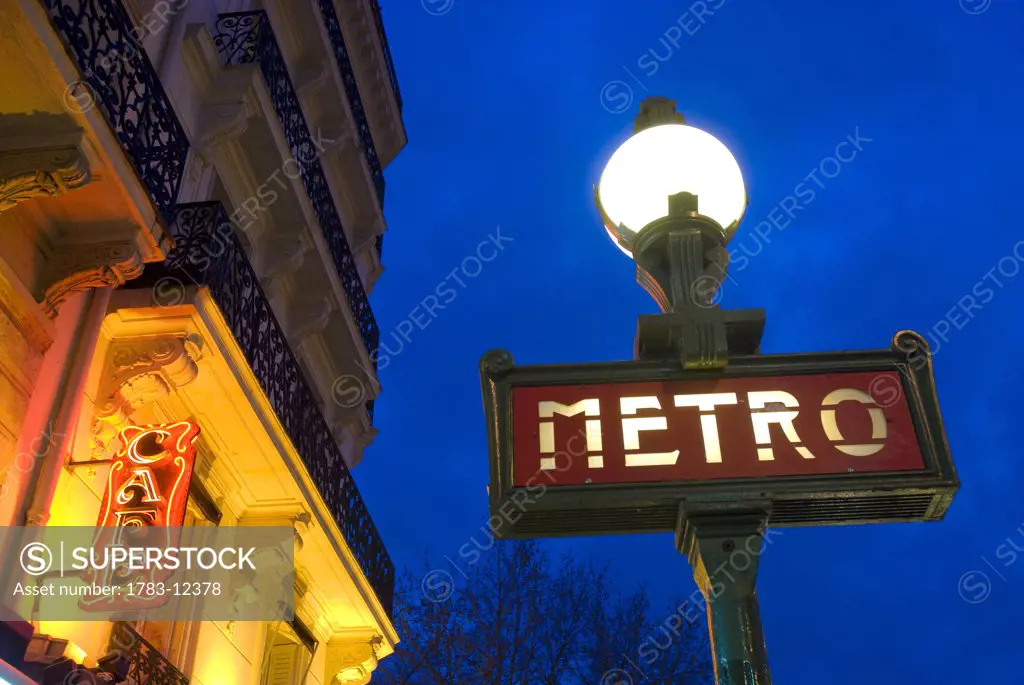 Detail of Maubert-Mutualite Metro station and cafe signs at dawn in the Latin Quarter (Quartier Latin) on the left bank., Maubert-Mutualite Metro station, Latin Quarter (Quartier Latin), Paris, France. 