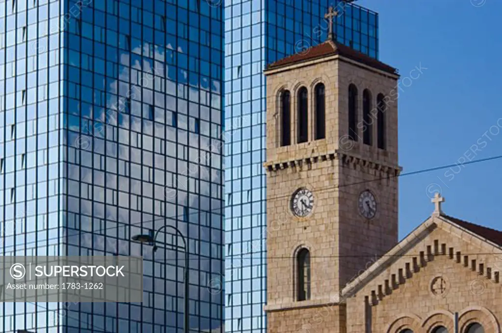Bosnia, Sarajevo, traditional church and glass towers, contrast 