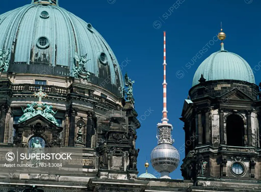 Berlin Cathedral with Fernsehturm behind, Berlin, Germany.