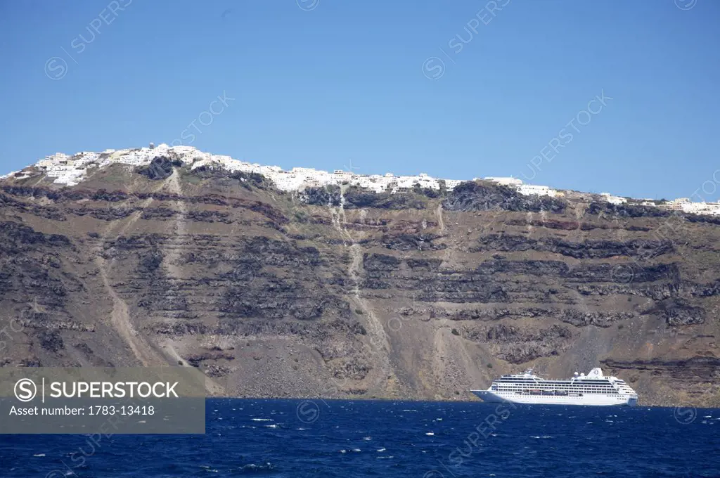 Cruise ship beside Santorini, Santorini from Nea Kameni