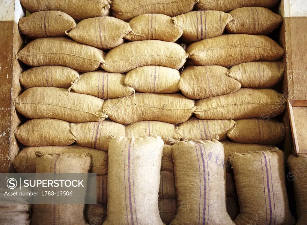 Burlap sacks stacked up in a nutmeg factory, Grenada 