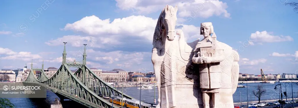 Statue of St Istvan on Gellert Hill and Liberty Bridge, Budapest, Hungary