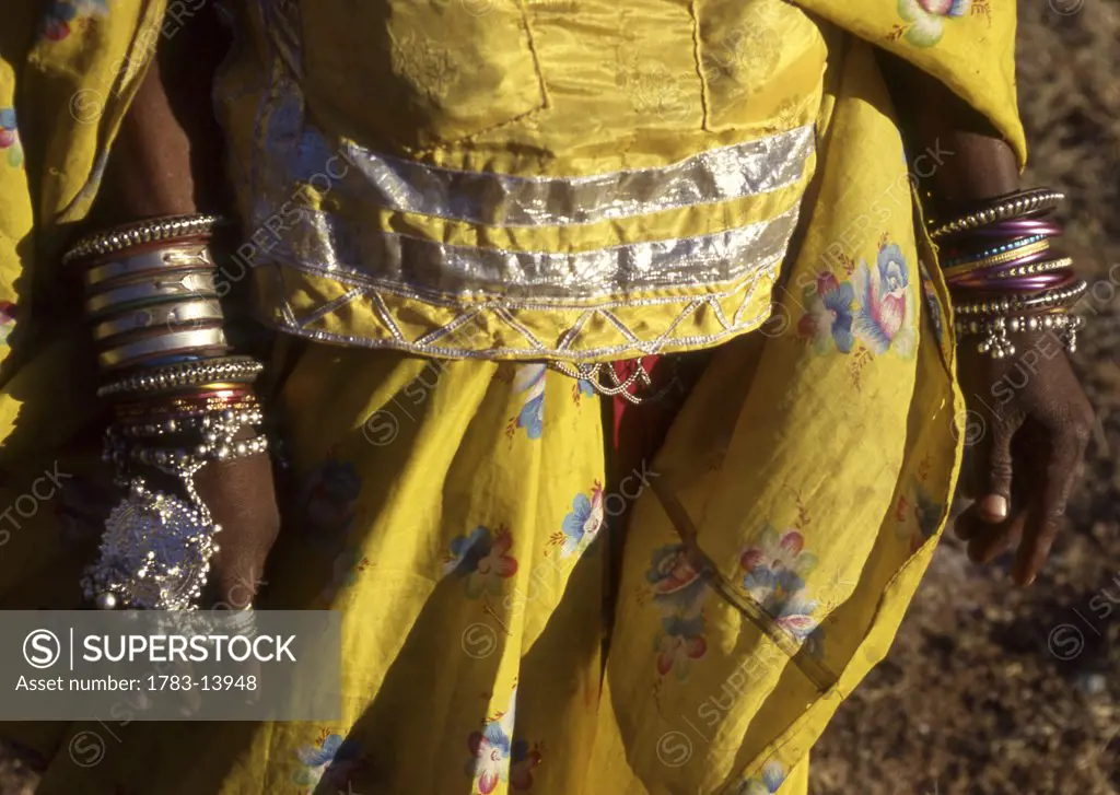 mid-section of woman at Pushkar Camel Fair, Rajasthan, India.