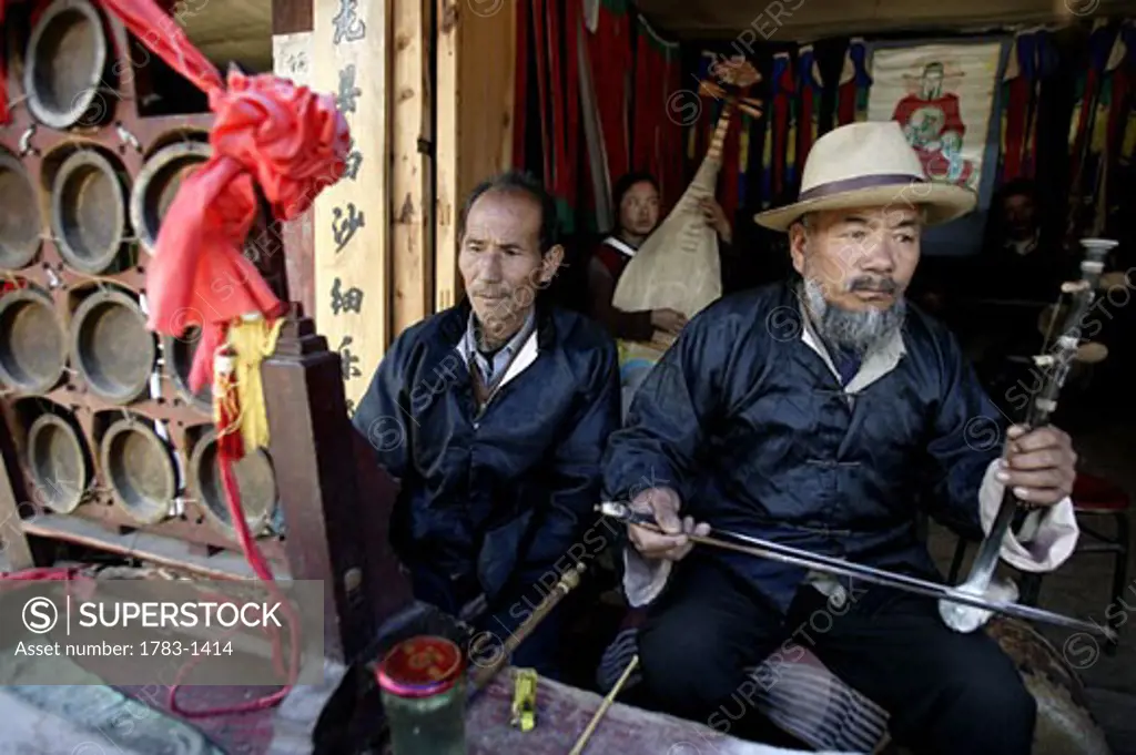 Musicians busking for a living, Lijiang, Yunnan Province, China