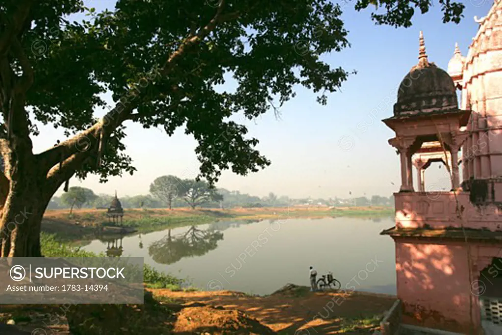 Rural village Hindu temple and lake , Madhya Pradesh, India
