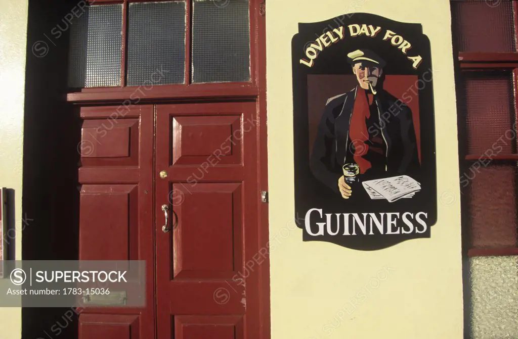 Guinness ad on wall of The Capitol Bar pub, Cashel, County Tipperary, Ireland.