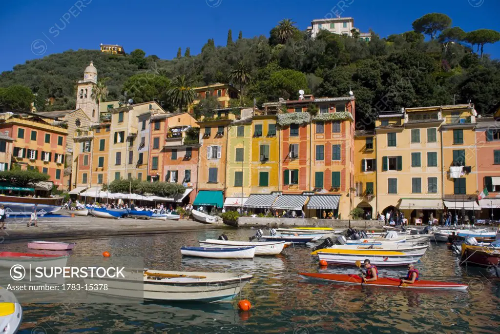 Colorful buildings along harbor in Portofino, Liguria, Italy