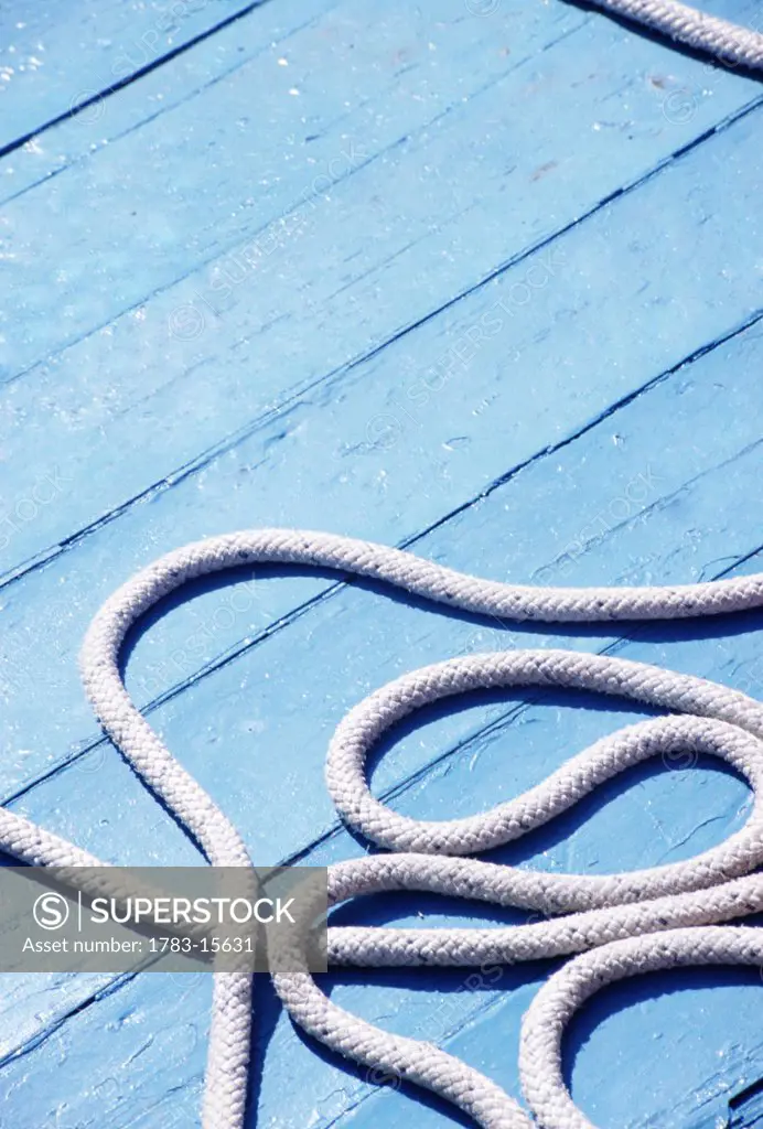 Rope on a blue bottomed boat, Panarea, Sicily, Italy