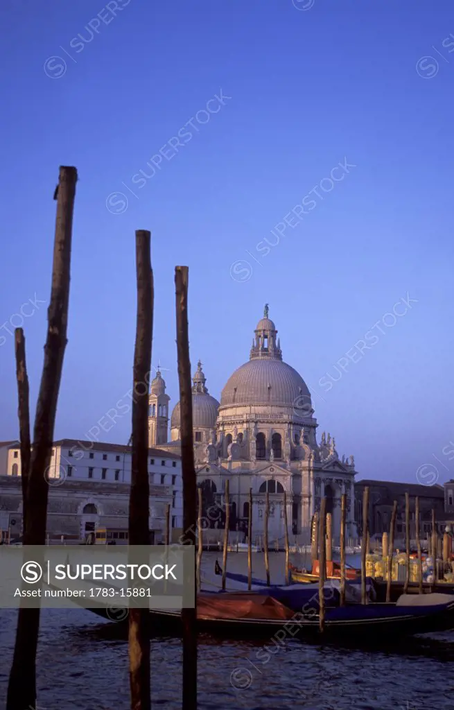Santa Maria della Salute, gondolas, and mooring sticks, Canal Grande, Venice, Italy
