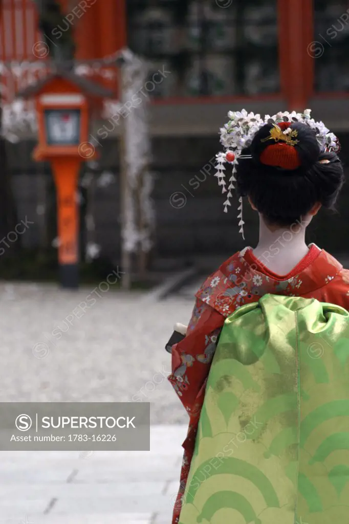 Geisha at temple, Rear View, Kyoto, Japan 