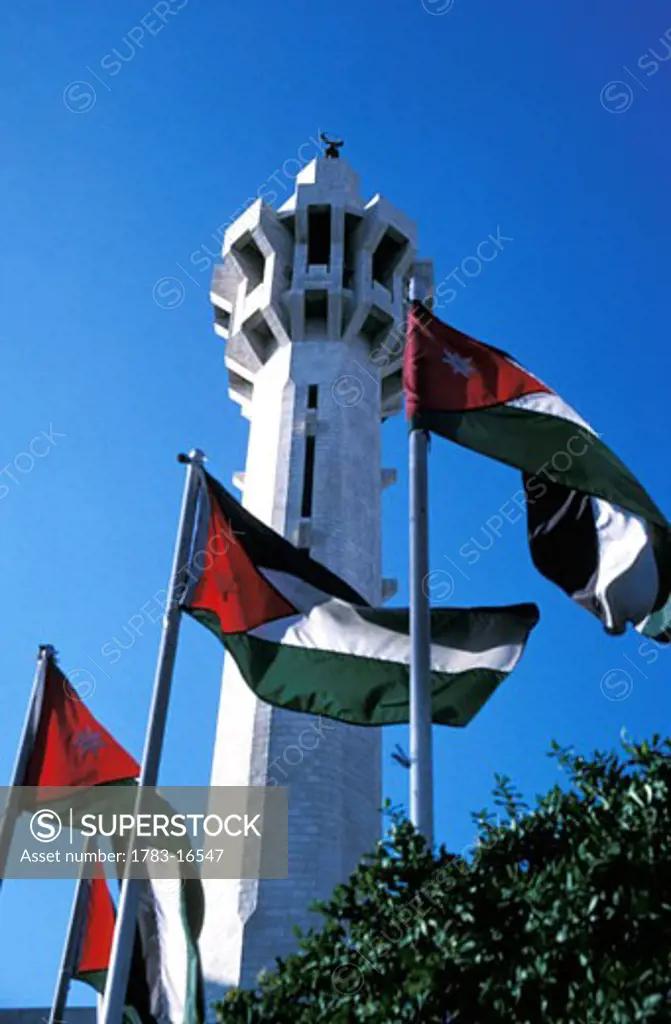 Minaret of King and flags at Abdullah Mosque, Amman, Jordan