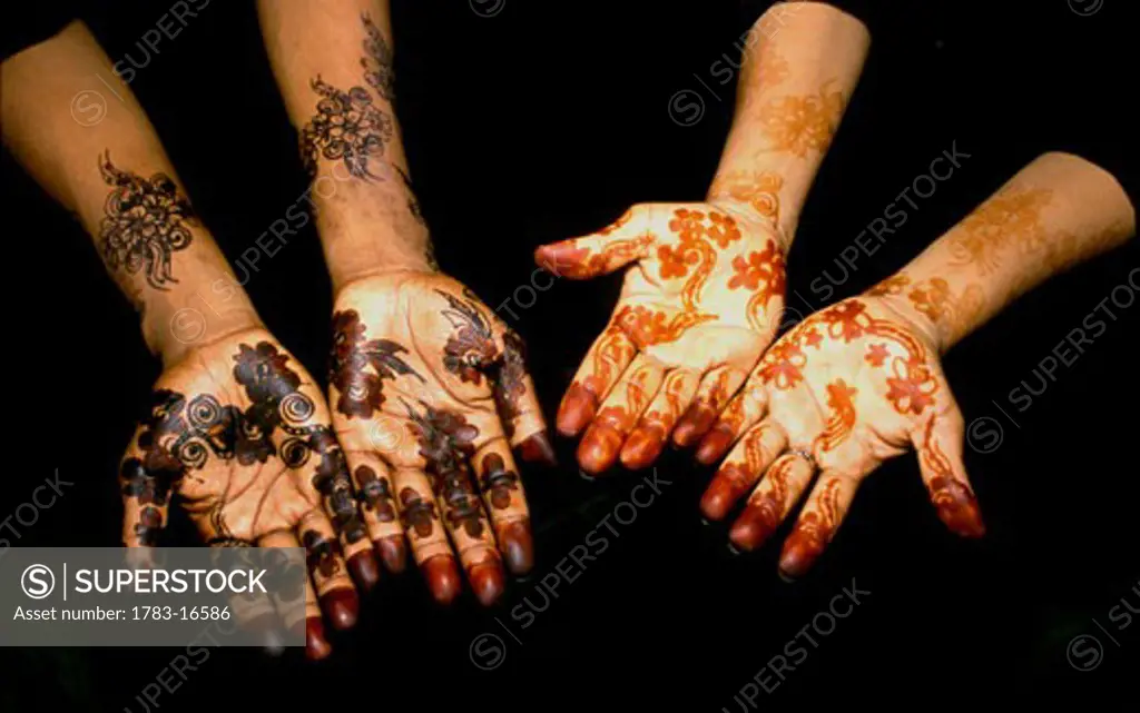 Henna tattoos on women's hands at Maulidi Festival, Lamu, Kenya.