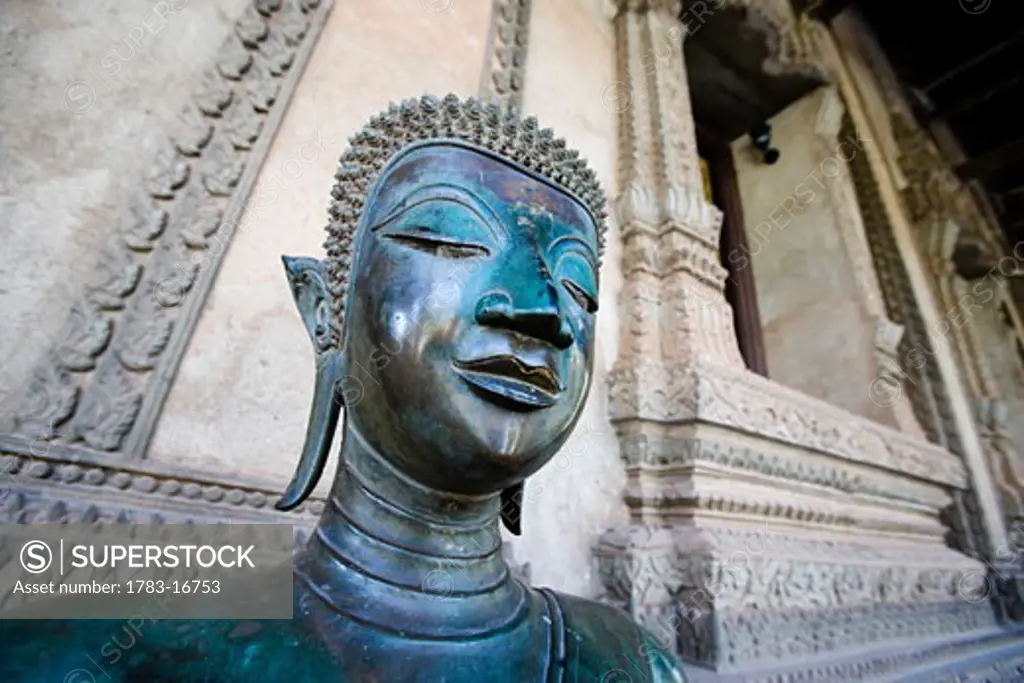 Statue of Buddha inside Ho Phro Keo temple, Vientiane, Laos.  Built in 1565.