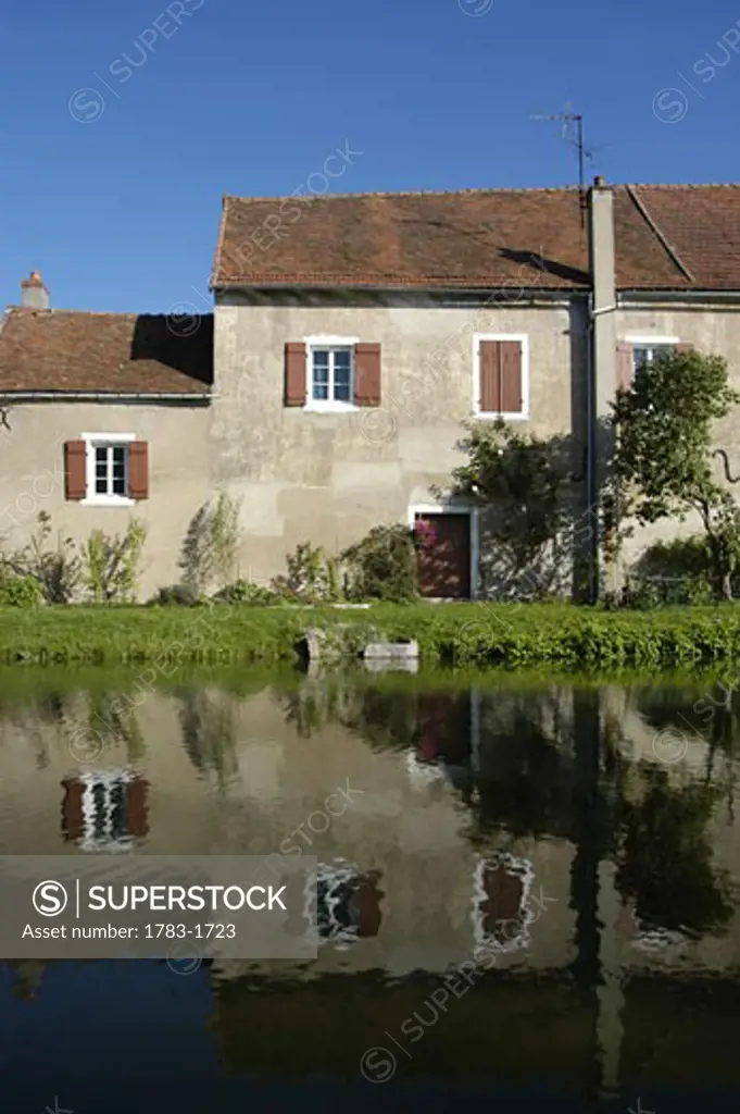 House in St Leger-sur-Dheune beside the Canal du Centre, Burgundy, France. 
