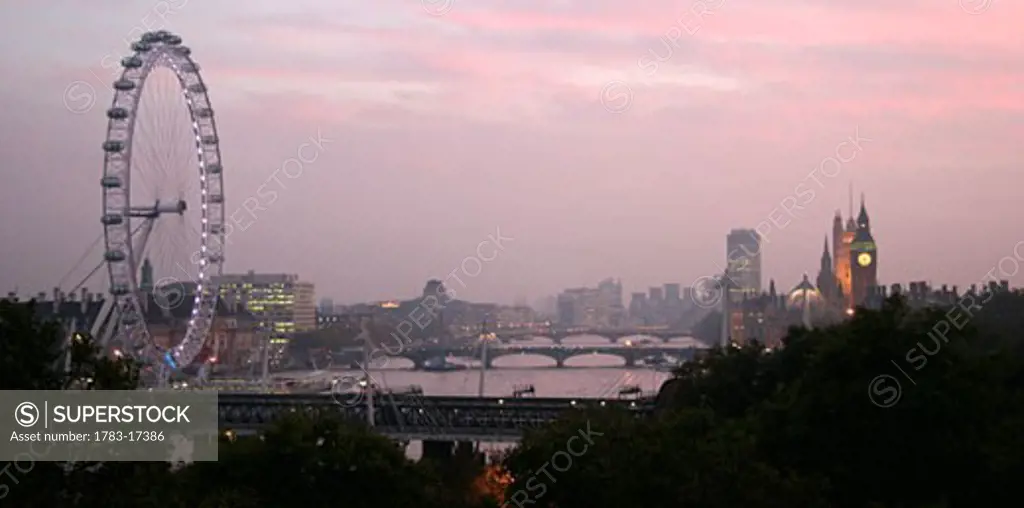 The River Thames with Parliament and the London Eye at dusk, London, England