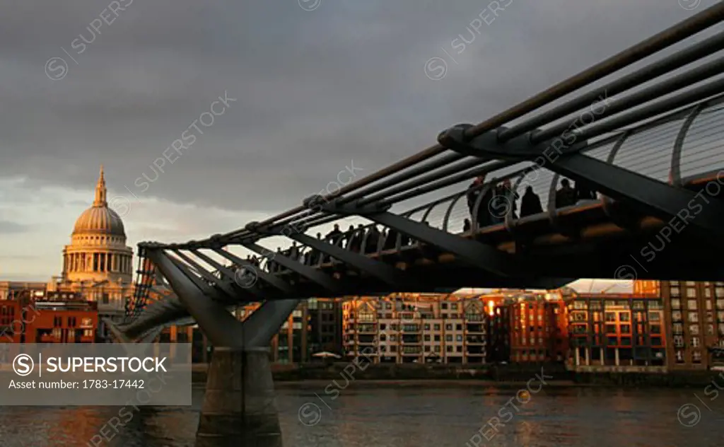 The Millennium Bridge stretching across the River Thames to St Pauls Cathedral, London, England