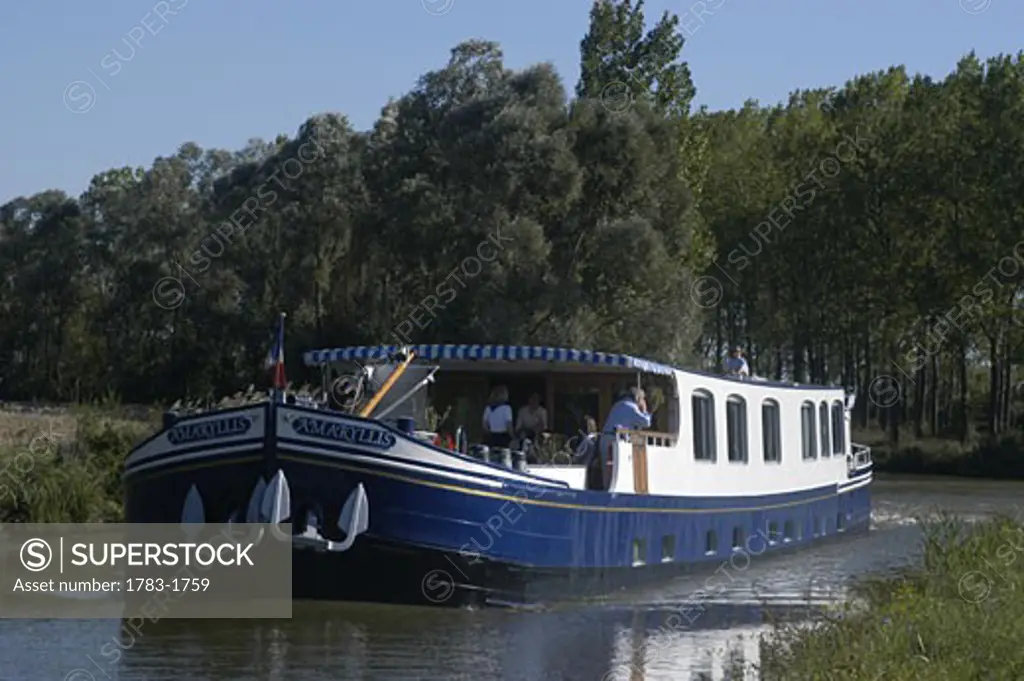 The Amaryllis, a French 'Peniche', on the Canal du Centre near Fragnes, Burgundy, France.