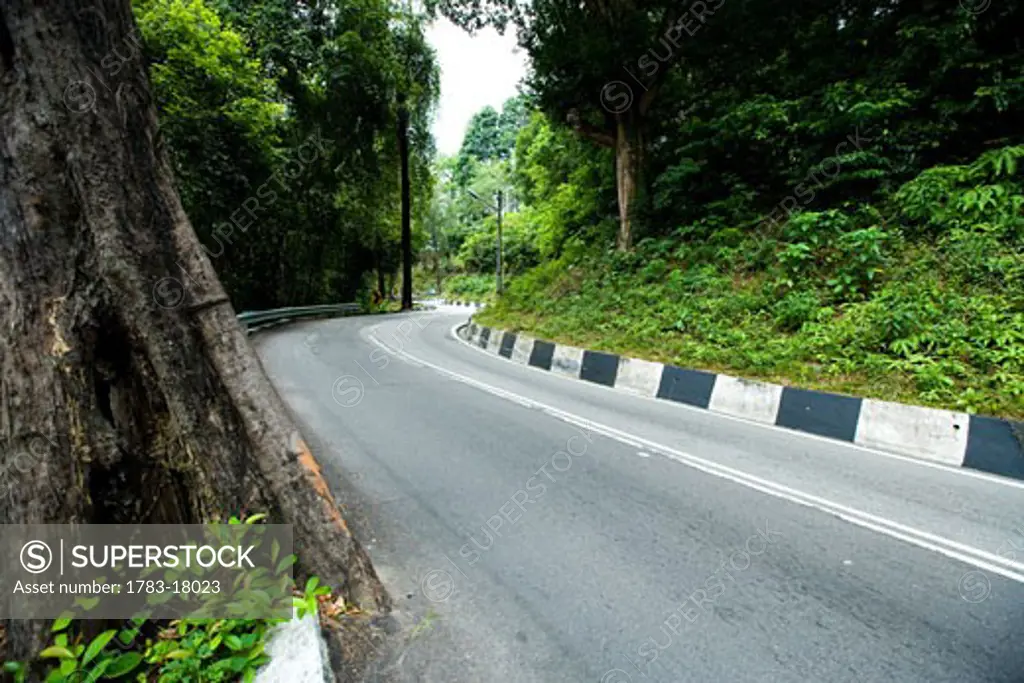 Mountain road around Penang Island, Pulau Pinang, Malaysia.