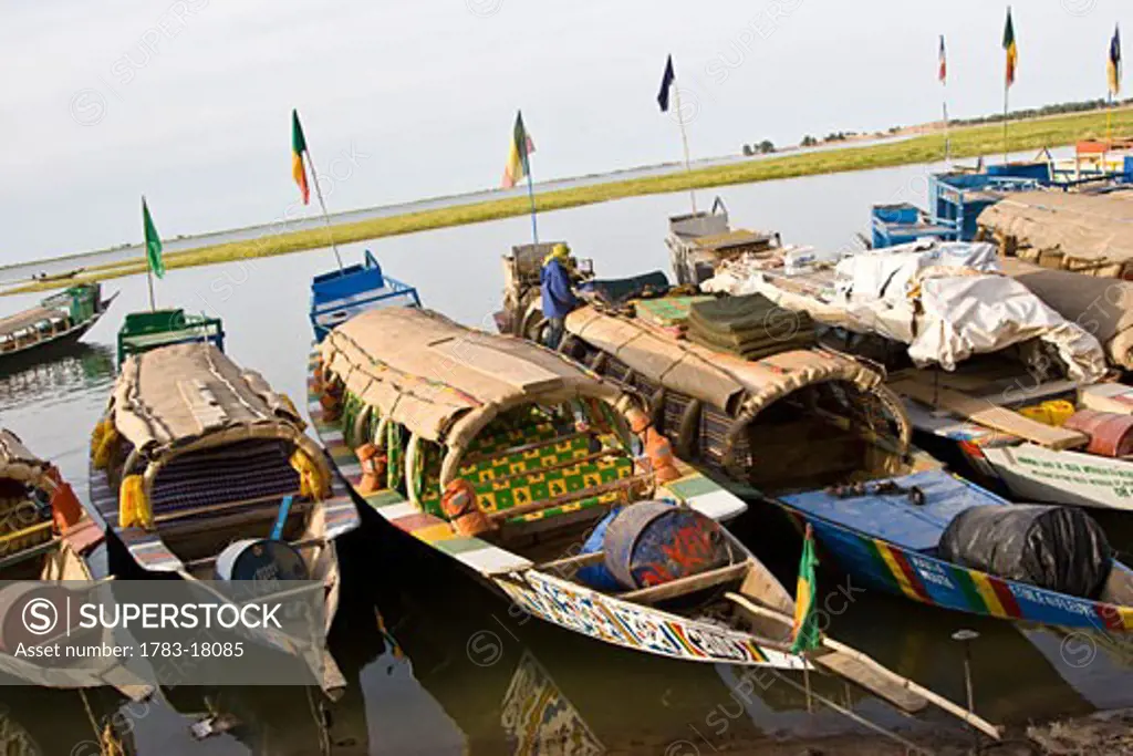 Tourist pinasse boats in Port de Kourione, Niger River, Mali.