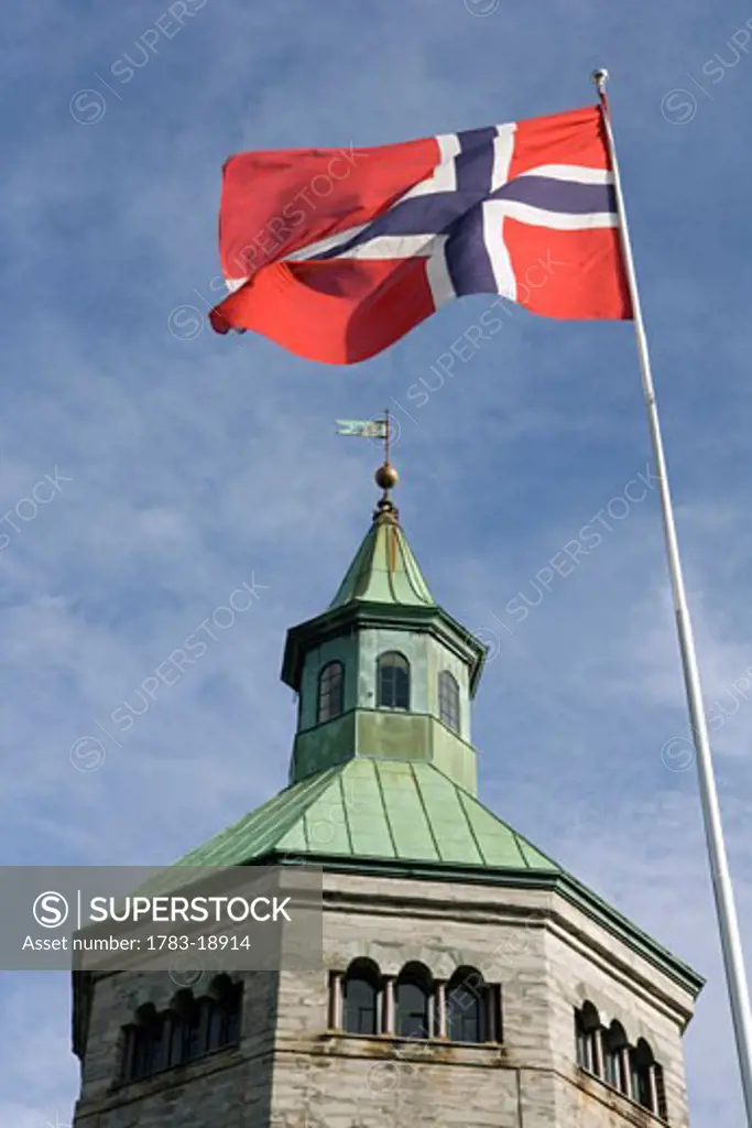 The Norwegian flag flying next to the Valberg Tower, Stavanger, Norway
