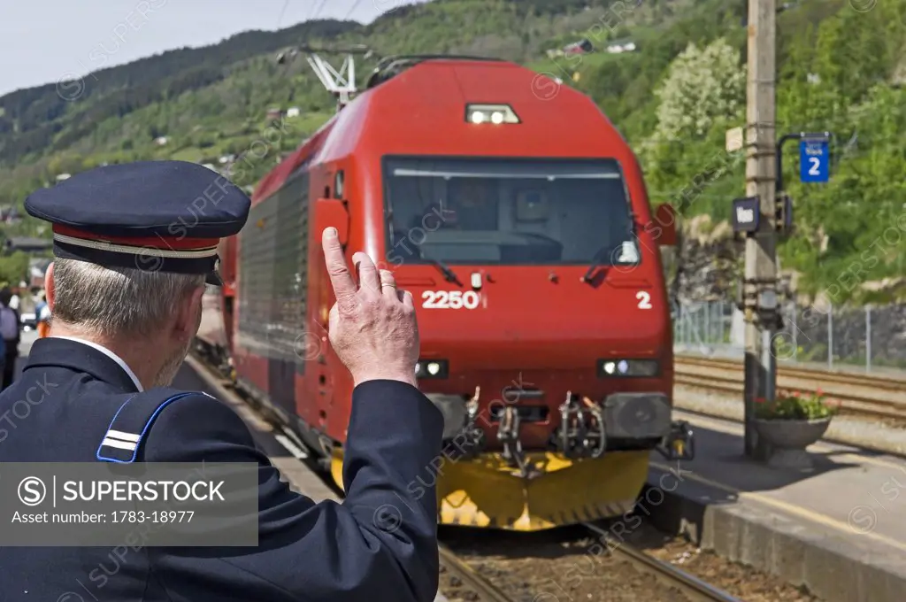 Conductor hailing train, Norway