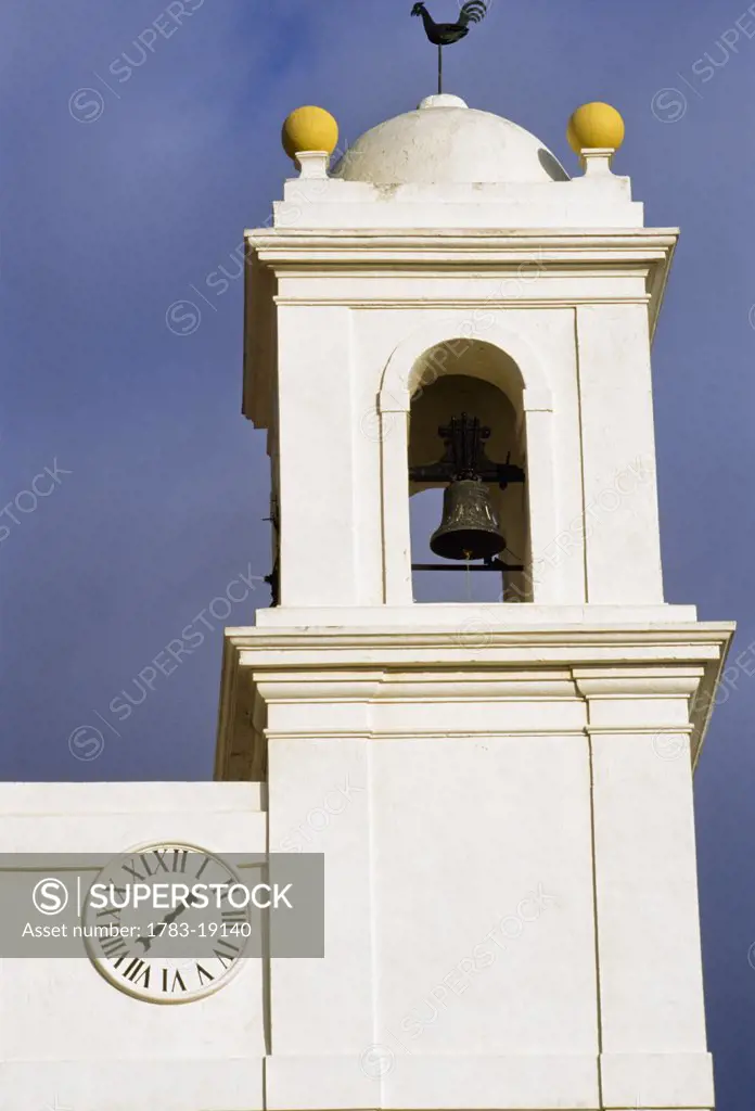 Bellfry and clock of Aljezur, Algarve, Portugal.
