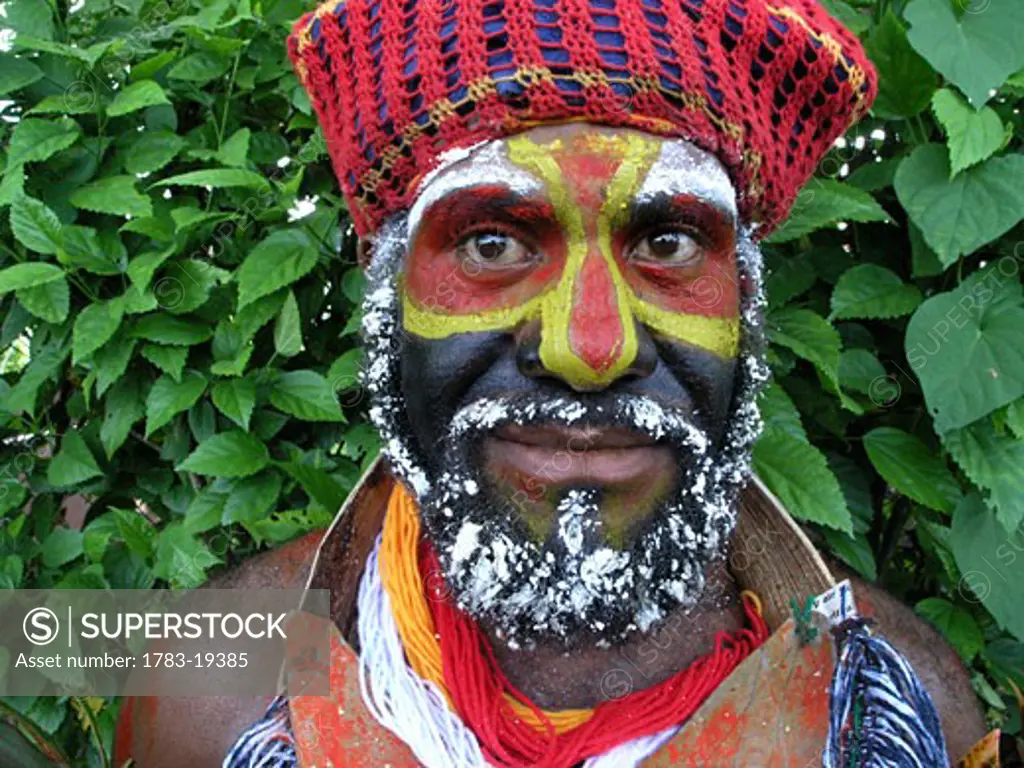 Portrait of highlander wearing face paint, Lae, Papua New Guinea.