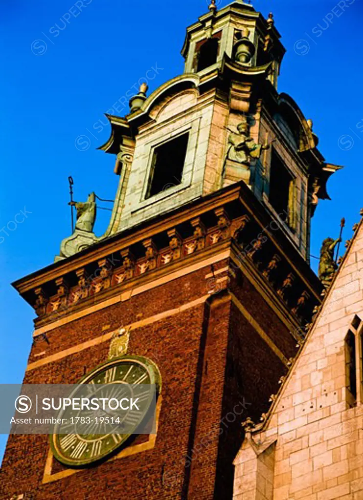 Baroque spire and clock on Krakow Cathedral, Wawel Hill, Krakow, Poland.