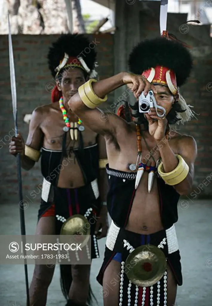 Chang Naga tribe in traditional dress during Moatsu festival of sowing, Chuchuyimlang village, Nagaland , North East Frontier States , India