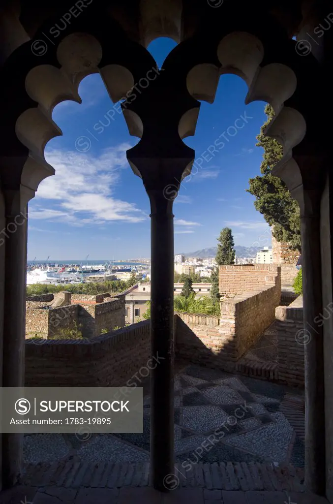 Looking out from arched window of Alcazaba, Malaga, Andalucia, Spain.
