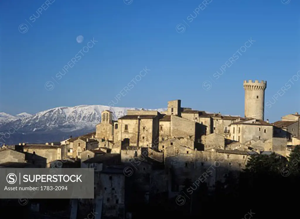 Moon setting over mountains at dawn, San Stefano de Sessannio, Abruzzo, Italy. 