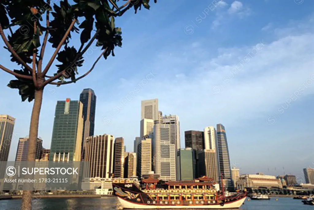 A Chinese Junk in front of the skyline of Singapore, Singapore