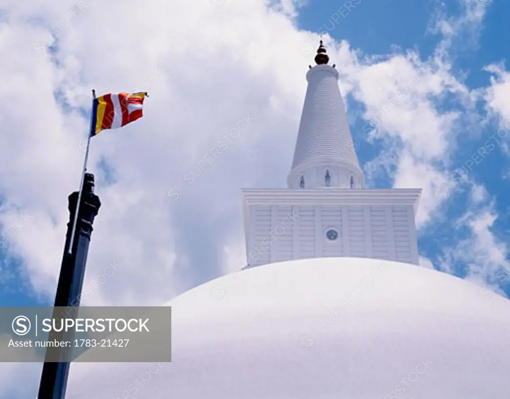 Buddhist flag and Ruwanweliseya Dagoba, Anuradhapura, Sri Lanka