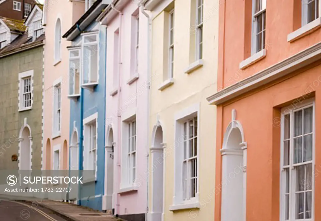 Pastel coloured traditional style houses in resort village of Salcombe, Devon, UK.